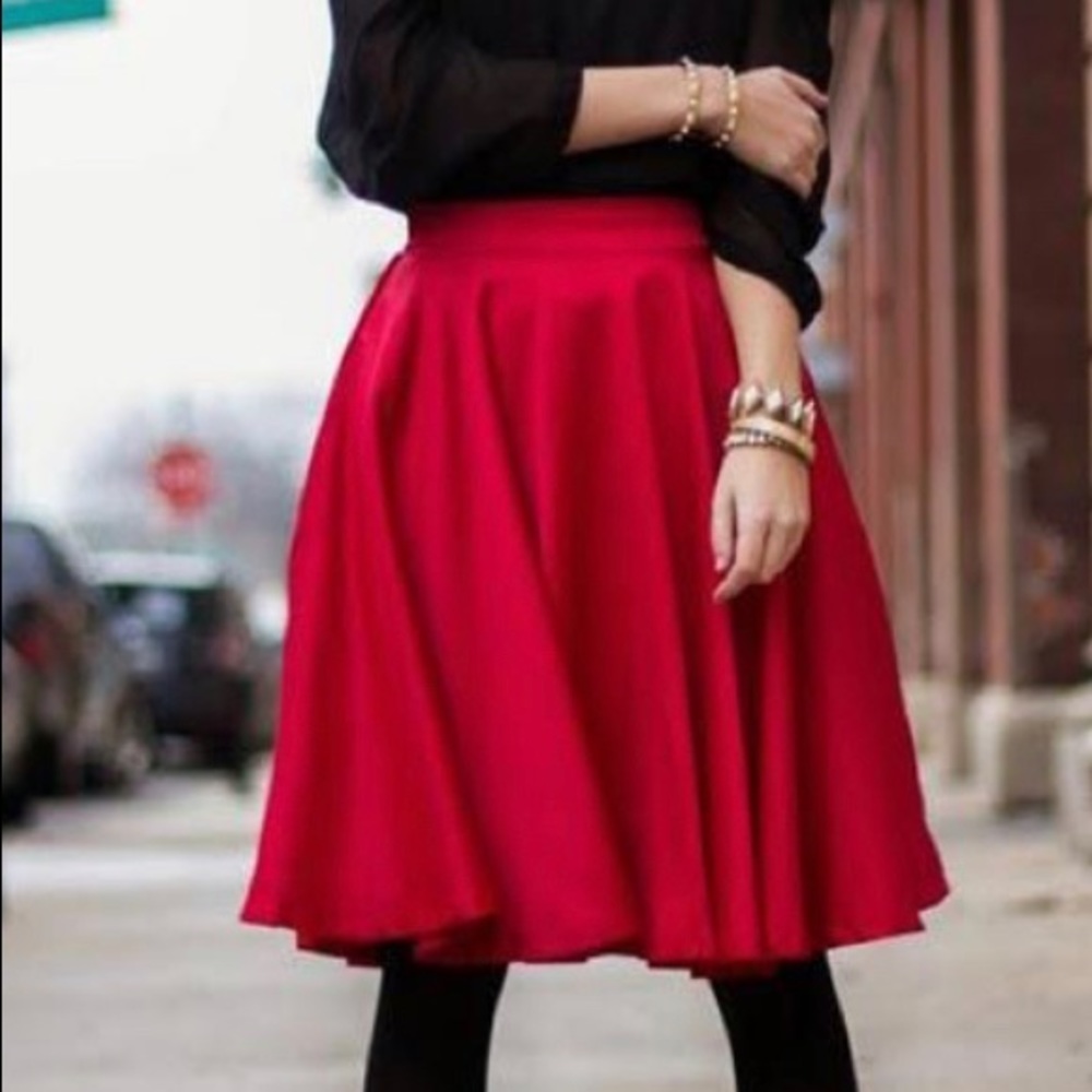 Size large black with red pokes dots,  nice material with POCKETS!